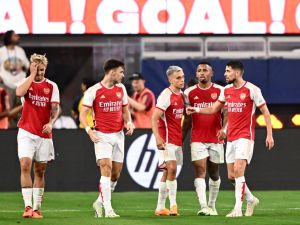Arsenal's Belgian midfielder Leandro Trossard (3L) celebrates scoring his team's fourth goal during a pre-season friendly football match between Arsenal FC and FC Barcelona at SoFi Stadium in Inglewood, California, on July 26, 2023. (Photo by Patrick T. Fallon / AFP)