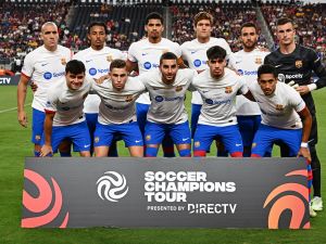 Barcelona's players pose for pictures ahead of the pre-season friendly football match between AC Milan and FC Barcelona, at Allegiant Stadium in Las Vegas, Nevada, on August 1, 2023. (Photo by Patrick T. Fallon / AFP)