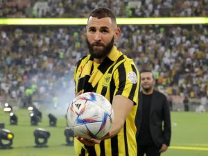 French forward Karim Benzema greets the crowd during his unveiling at King Abdullah Sports City stadium in Jeddah, on June 8, 2023. Benzema was unveiled as an Al-Ittihad player in front of thousands of fans in Saudi Arabia on June 8, a day after the oil-rich kingdom just failed to reel in Lionel Messi. (Photo by AFP)