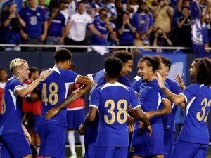 Chelsea's English forward Mason Burstow (2nd L) celebrates scoring his team's first goal during a pre-season friendly football match between Chelsea FC and Borussia Dortmund BVB at Soldier Field in Chicago, Illinois, on August 2, 2023. (Photo by KAMIL KRZACZYNSKI / AFP)