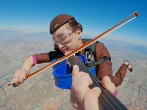 Watch – How Etihad Airways Did The Impossible:  A Mid-air Orchestra In Skydiving Stunt
