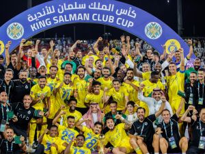 Nassr's players celebrate winning the 2023 Arab Club Champions Cup after their final football match between Saudi Arabia's Al-Hilal and Al-Nassr at the King Fahd Stadium in Taif on August 12, 2023. (Photo by AFP)