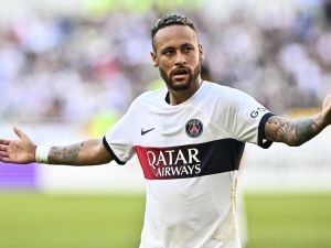 Paris Saint-Germain’s Neymar celebrates after scoring a goal against Jeonbuk Hyundai Motors during their friendly football match at the Asiad Main Stadium in Busan on August 3, 2023. (Photo by ANTHONY WALLACE / AFP)