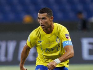 Nassr's Portuguese forward Cristiano Ronaldo runs with the ball during the 2023 Arab Club Champions Cup group C football match between Saudi Arabia's Al-Nassr and Saudi Arabia's Al-Shabab at the King Fahd Stadium in Taif on July 28, 2023. (Photo by AFP)