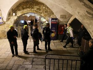 Israeli security forces gather near the scene of a stabbing attack in Jerusalem's Old City on March 7, 2022. AFP