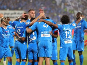 Hilal's players celebrate a goal during the Saudi Pro League football match between Al-Hilal and Al-Riyadh at Prince Faisal Bin Fahd Stadium in Riyadh on September 15, 2023. (Photo by Abdullah Mahdi / AFP)