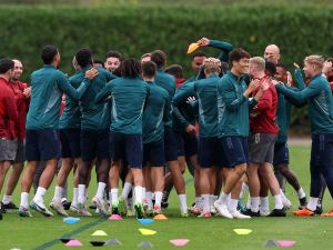 Arsenal's Japanese defender #18 Takehiro Tomiyasu (6R) and teammates attend a team training session at Arsenal's training ground in north London on September 19, 2023, ahead of their UEFA Champions League Group B football match against PSV Eindhoven. (Photo by Adrian DENNIS / AFP)