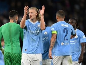Manchester City's Norwegian striker #09 Erling Haaland celebrates at the end of the UEFA Champions League Group G football match between Manchester City and FC Crvena Zvezda (Red Star Belgrade) at the Etihad Stadium in Manchester, north west England, on September 19, 2023. Manchester City wins 3 - 1 against FC Crvena Zvezda (Red Star Belgrade). (Photo by Paul ELLIS / AFP)