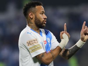 Hilal's Brazilian forward #10 Neymar speaks to teammates during the Saudi Pro League football match between Damac FC and Al-Hilal SFC at Prince Sultan bin Abdul Aziz Stadium in Abha on September 21, 2023. (Photo by AFP)