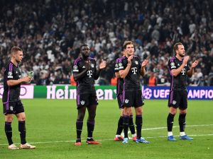 (LtoR) Bayern Munich's German midfielder #06 Joshua Kimmich, Bayern Munich's French defender #02 Dayot Upamecano, Bayern Munich's German midfielder #08 Leon Goretzka and Bayern Munich's English forward #09 Harry Kane celebrate at the end of the UEFA Champions League Group A football match between FC Copenhagen and FC Bayern Munich in Copenhagen, Denmark on October 3, 2023. Bayern Munich won the match 2-1. (Photo by Sergei GAPON / AFP)