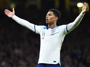 England's midfielder Jude Bellingham celebrates scoring the team's second goal during the international friendly football match between Scotland and England, at Hampden Park in Glasgow, on September 12, 2023. The match is also the 150th Anniversary Heritage football match, commemorating the 150th anniversary of the first meeting between the two teams, on 30 November 1872. (Photo by ANDY BUCHANAN / AFP)