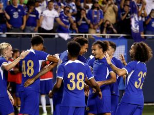 Chelsea's English forward Mason Burstow (2nd L) celebrates scoring his team's first goal during a pre-season friendly football match between Chelsea FC and Borussia Dortmund BVB at Soldier Field in Chicago, Illinois, on August 2, 2023. (Photo by KAMIL KRZACZYNSKI / AFP)