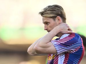 Barcelona's Dutch midfielder #21 Frenkie de Jong looks on before the start of the Spanish Liga football match between FC Barcelona and RC Celta de Vigo at the at the Estadi Olimpic Lluis Companys in Barcelona on September 23, 2023. (Photo by Pau BARRENA / AFP)