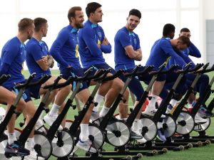 England's striker Harry Kane (3L), England's defender Harry Maguire (C) and England's midfielder Declan Rice (4R) react during an England football team training session at St George's Park in Burton-on-Trent, central England, on October 10, 2023. (Photo by Darren Staples / POOL / AFP)
