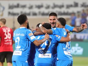 Hilal's players celebrate their team's goal during the Saudi Pro League football match between Al-Hilal and Al-Riyadh at Prince Faisal Bin Fahd Stadium in Riyadh on September 15, 2023. (Photo by Fayez Nureldine / AFP)