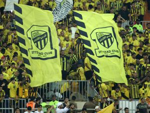 Ittihad's fans cheer for their team during the Saudi Pro League football match between Al-Ittihad and Al-Hilal at Prince Abdullah al-Faisal Stadium in Jeddah on September 1, 2023. (Photo by AFP)