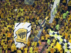 Ittihad fans cheer ahead of the AFC Champions League Group C football match between Saudi's Al-Ittihad and Iraq's Al-Quwa Al-Jawiya at the King Abdullah Sports City in Jeddah on October 23, 2023. (Photo by AFP)