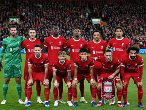 pose for a team photo ahead of kikc off in the UEFA Europa League group E football match between Liverpool and Royale Union Saint-Gilloise at Anfield in Liverpool, north west England on October 5, 2023. (Photo by Oli SCARFF / AFP)