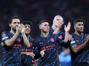 Manchester City's players applaud after the UEFA Champions League Group G football match between RB Leipzig and Manchester City in Leipzig, eastern Germany on October 4, 2023. (Photo by Ronny HARTMANN / AFP)