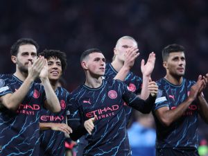 Manchester City's players applaud after the UEFA Champions League Group G football match between RB Leipzig and Manchester City in Leipzig, eastern Germany on October 4, 2023. (Photo by Ronny HARTMANN / AFP)