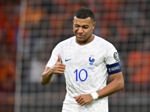 France's forward Kylian Mbappé reacts during the Euro 2024 qualifying football match between the Netherlands and France at the Johan Cruijff ArenA in Amsterdam on October 13, 2023. (Photo by JOHN THYS / AFP)