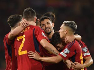 Spain's players celebrate their team's second goal during the EURO 2024 first round group A qualifying football match between Spain and Scotland at the La Cartuja stadium in Seville on October 12, 2023. (Photo by JORGE GUERRERO / AFP)