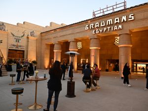 (Photo by Robyn Beck / AFP) Visitors attend the press preview for the reopening of the Egyptian Theatre, in Hollywood, California