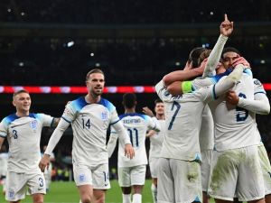 England's striker #09 Harry Kane celebrates after scoring his team thrid goal during the Euro 2024 qualifying group C football match between England and Italy at Wembley, in London, on October 17, 2023. (Photo by Glyn KIRK / AFP)