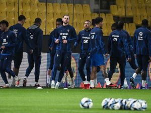 France's midfielder Adrien Rabiot (L), forward Kylian Mbappe (R) and team mates take part in a training session at the Agia Sophia Stadium in Athens on November 20, 2023, on the eve of the UEFA Euro 2024 group B qualifying football match between Greece and France. (Photo by Angelos Tzortzinis / AFP)