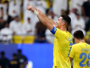 Nassr's Portuguese forward #07 Cristiano Ronaldo celebrates after scoring a goal during the AFC Champions League Group E football match between Saudi's al-Nassr and Qatar’s al-Duhail at the King Saud University Stadium in Riyadh on October 24, 2023. (Photo by Fayez NURELDINE / AFP)