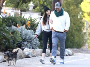 Dakota Johnson shares how Chris Martin supports her during her struggles. (RMBI/ Backgrid)