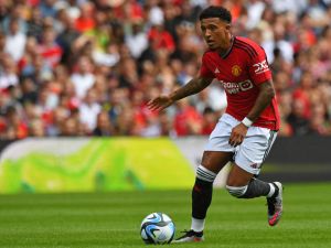 Manchester United's English striker Jadon Sancho runs with the ball during the pre-season friendly football match between Manchester United and Lyon at Murrayfield, in Edinburgh, on July 19, 2023. (Photo by ANDY BUCHANAN / AFP)