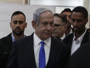 Israeli Prime Minister Benjamin Netanyahu arrives at the District Court in Jerusalem. (Atef Safadi/ AFP)