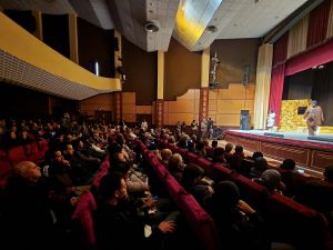 Actors perform a scene in a play during the 12th edition of the National Theatre Festival in Tripoli. (Photo by Mahmud Turkia / AFP) theater
