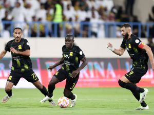 Ittihad's French forward #07 N'Golo Kante, Ittihad's French forward #09 Karim Benzema and Ittihad's Saudi midfielder #77 Saleh al-Amri advance during the Saudi Pro League football match between Al-Ittihad and Al-Akhdoud at Prince Hathloul bin Abdulaziz Stadium in Najran on September 14, 2023. (Photo by AFP)