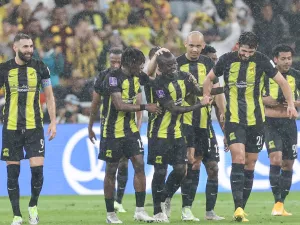 Ittihad's French forward #09 Karim Benzema (L) and Ittihad's French midfielder #07 N'Golo Kante (C) celebrate after a goal during the FIFA Club World Cup first round football match between Al-Ittihad and Auckland City at the King Abdullah Sports City stadium in Jeddah, on December 12, 2023. Al Ittihad secured progress from the first round of the Club World Cup with a convincing 3-0 win against Auckland City. (Photo by AFP)
