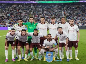 Manchester City players pose for a photo before the start of the FIFA Club World Cup football semi-final match between England's Manchester City and Japan's Urawa Red Diamonds at King Abdullah Sports City in Jeddah on December 19, 2023. (Photo by Giuseppe CACACE / AFP)