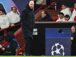 Manchester United's Dutch manager Erik ten Hag reacts during the UEFA Champions League group A football match between Manchester United and FC Bayern Munich at Old Trafford stadium in Manchester, north west England, on December 12, 2023. (Photo by PETER POWELL / AFP)