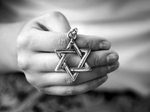 oung woman's hand holding a David Star