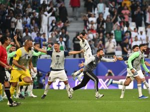 العراق تتألق في كأس آسيا (Photo by HECTOR RETAMAL / AFP)