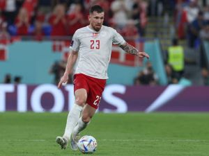Denmark's midfielder #23 Pierre-Emile Hojbjerg runs with the ball during the Qatar 2022 World Cup Group D football match between France and Denmark at Stadium 974 in Doha on November 26, 2022. (Photo by Giuseppe CACACE / AFP)