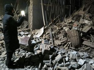 7.1-magnitude earthquake strikes China's Xinjiang region, tremors reach neighboring countries. (Chinatopix/ AP)