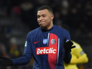 Paris Saint-Germain's French forward #07 Kylian Mbappe reacts during the French Cup round of 32 football match between US Orleans Loiret Football and Paris Saint-Germain (PSG) at the Stade de la Source, in Orleans, central France, on January 20, 2024. (Photo by Guillaume SOUVANT / AFP)