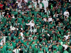 Saudi Arabia supporters cheer during the Qatar 2023 AFC Asian Cup Group F football match between Saudi Arabia and Thailand at Education City Stadium in al-Rayyan, west of Doha, on January 25, 2024. (Photo by Giuseppe CACACE / AFP)