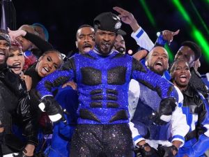 Usher celebrated 30 years of R&B excellence at the 2024 Super Bowl halftime show. (Timothy A. Clary/ AFP)