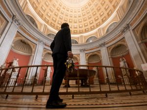 Gianni Crea, key keeper of the Vatican Museums, walks in the Round Hall during a private visit of the museums by night. (Photo by Tiziana FABI / AFP) Vatican