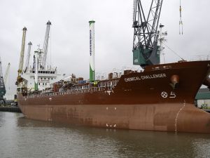 The world's first chemical tanker ship fitted with massive rigid aluminium "sails" has left Rotterdam, its owner hoping to plot a route to bringing down the shipping industry's huge carbon footprint. (Photo by Nick Gammon / AFP) carbon emissions