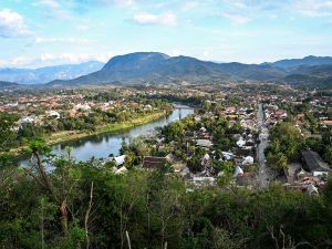 a general view of the Mekong river in Luang Prabang. A short boat ride upstream from the ancient Laotian royal capital of Luang Prabang, a massive dam is under construction that critics say threatens the riverside town's allure and heritage status. (Photo by TANG CHHIN Sothy / AFP) Laos