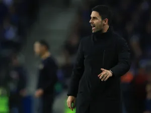 Arsenal's Spanish coach Mikel Arteta reacts during the UEFA Champions League last 16 first leg football match between FC Porto and Arsenal FC at the Dragao stadium in Porto on February 21, 2024. (Photo by PATRICIA DE MELO MOREIRA / AFP)