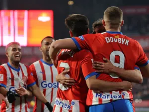 Girona's Ukrainian forward #09 Artem Dovbyk celebrates scoring his team's third goal during the Spanish League football match between Girona FC and Sevilla FC at the Montilivi stadium in Girona on January 21, 2024. (Photo by LLUIS GENE / AFP)
